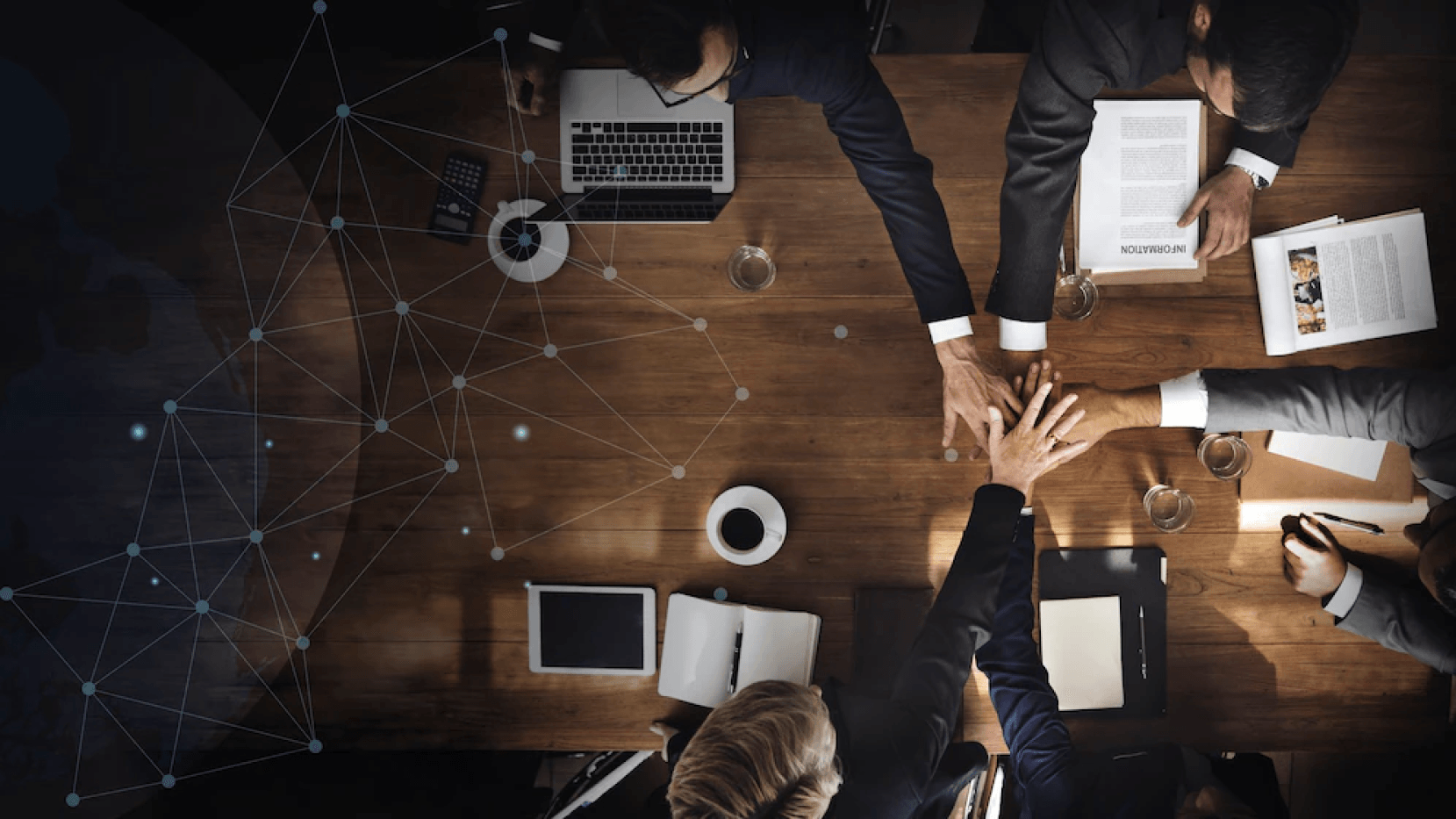 Group of people put their hands together